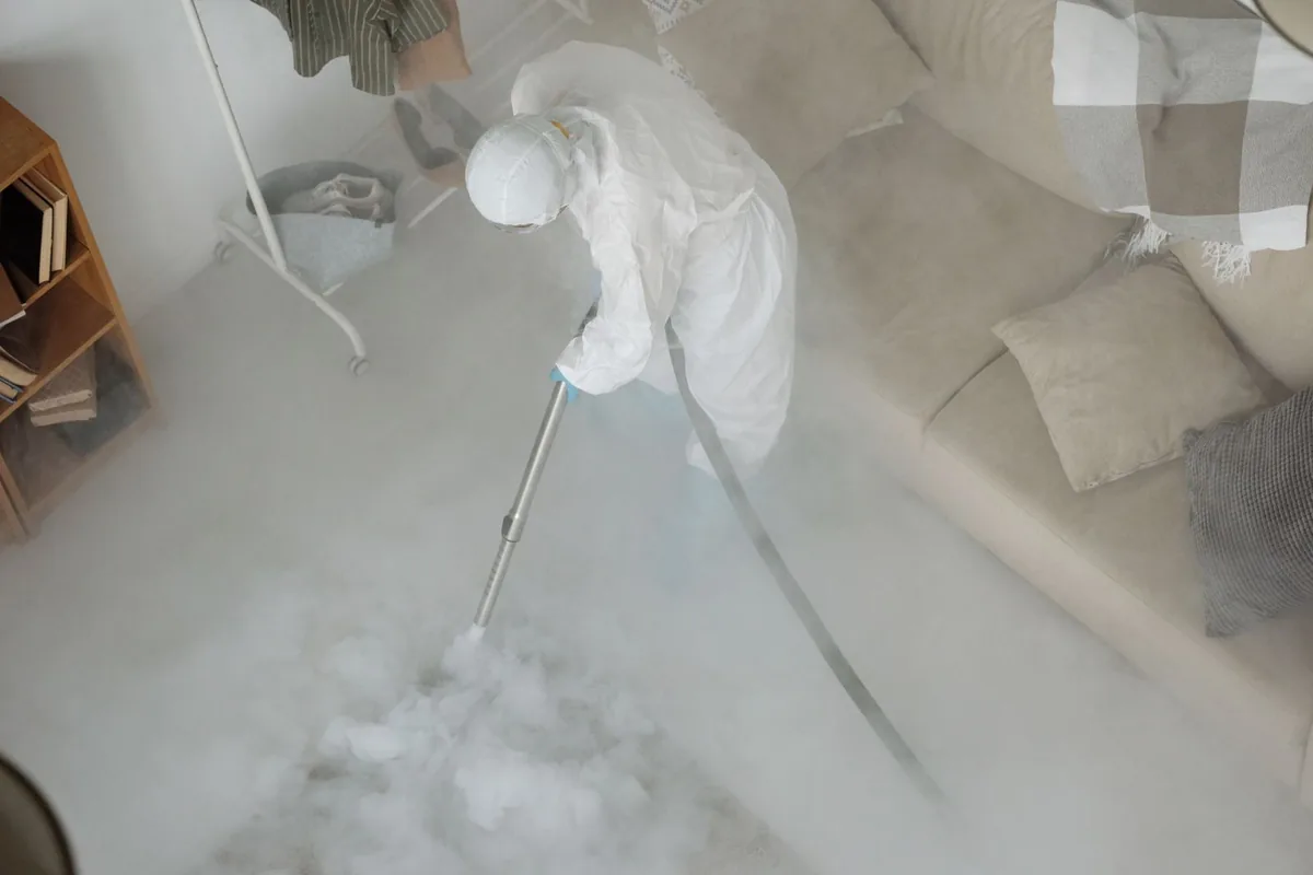 Biohazard cleanup technician in protective equipment, Rosepine, LA